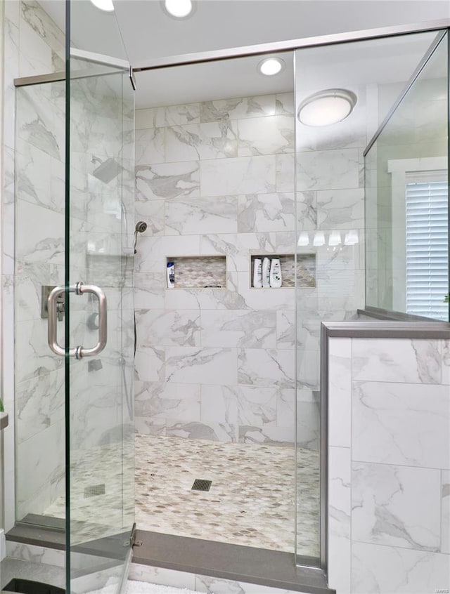 bathroom with walk in shower