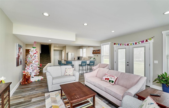 living room featuring french doors and wood-type flooring