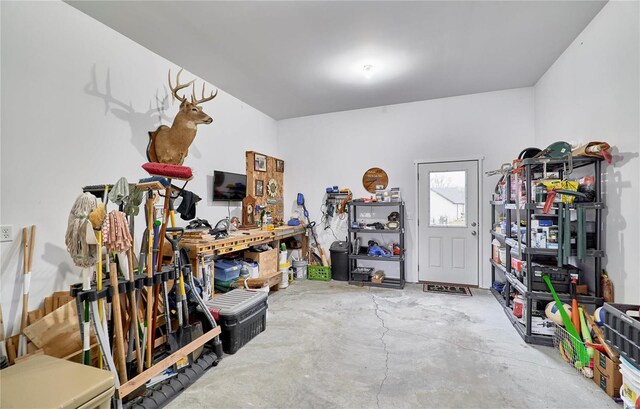 garage with a workshop area