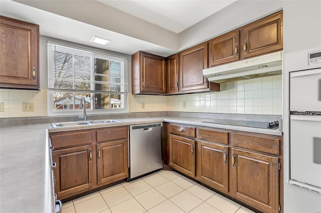 kitchen with stainless steel dishwasher, white double oven, black electric cooktop, sink, and light tile patterned floors