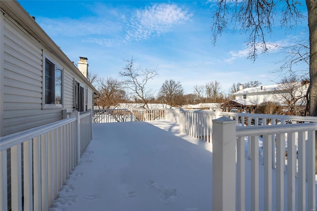 view of yard covered in snow