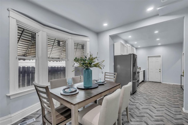 dining space with visible vents, baseboards, and recessed lighting