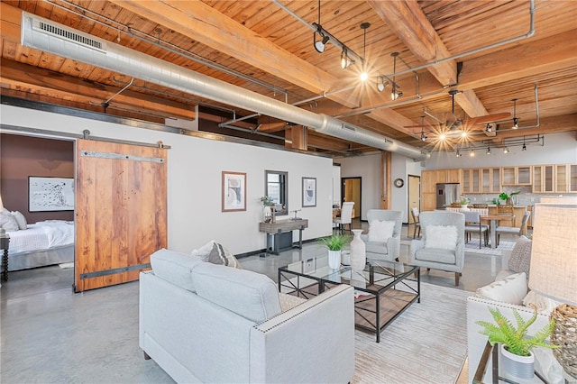 living room featuring a barn door, wooden ceiling, beam ceiling, and track lighting