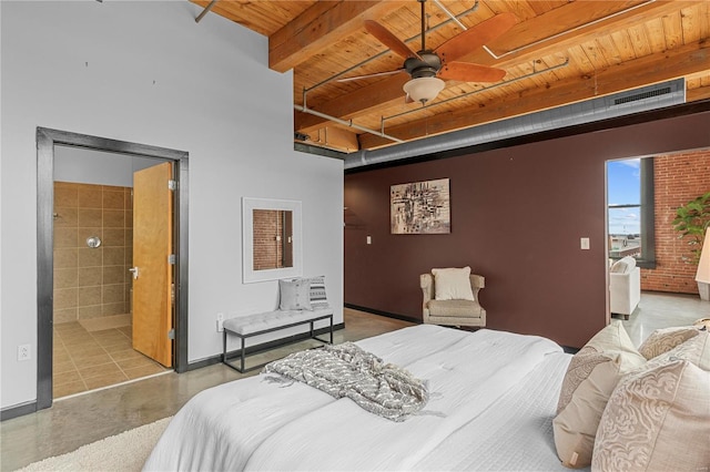 bedroom featuring beamed ceiling, ensuite bathroom, ceiling fan, and wooden ceiling