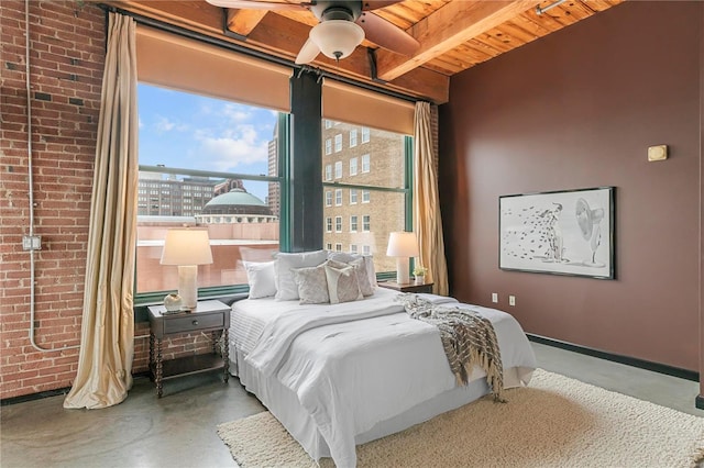 bedroom featuring ceiling fan, wooden ceiling, beamed ceiling, brick wall, and concrete flooring