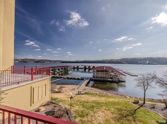 dock area with a water view