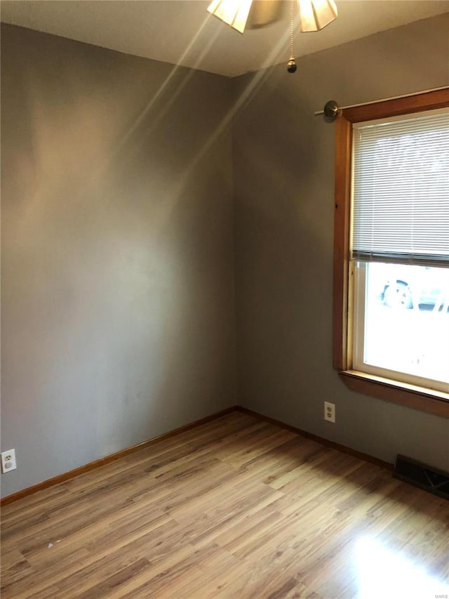 bonus room with light wood-type flooring