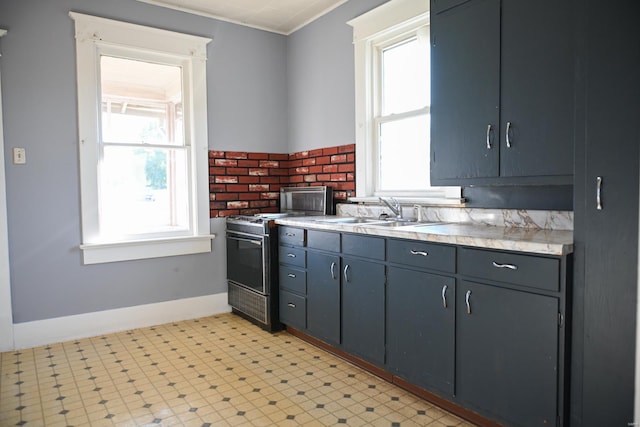 kitchen with stove and sink