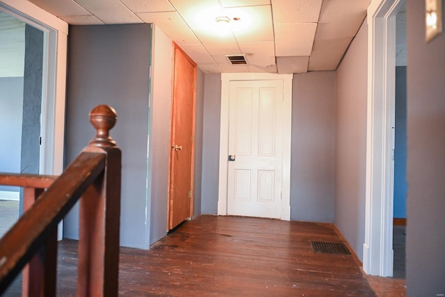 hall with dark wood-type flooring