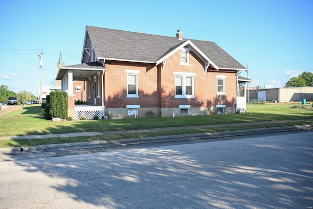 view of property exterior featuring a yard