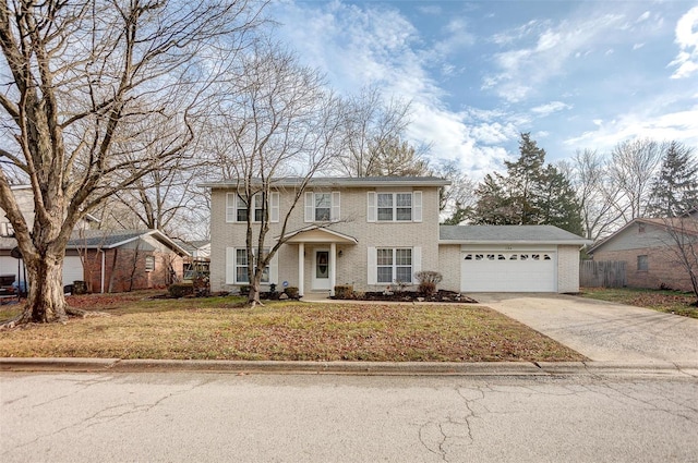 view of front of home with a garage and a front yard