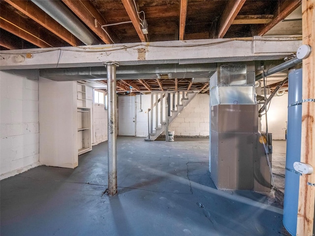 basement featuring heating unit