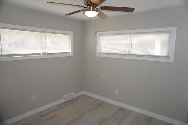 unfurnished room with light hardwood / wood-style floors and ceiling fan