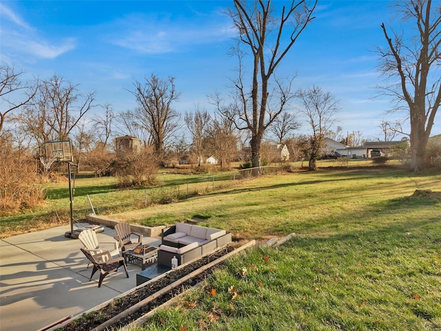 view of yard with an outdoor living space and a patio