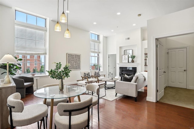 dining room with dark hardwood / wood-style floors