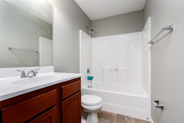 full bathroom featuring vanity, tub / shower combination, and toilet