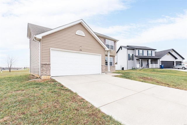 view of front of property featuring a garage and a front yard