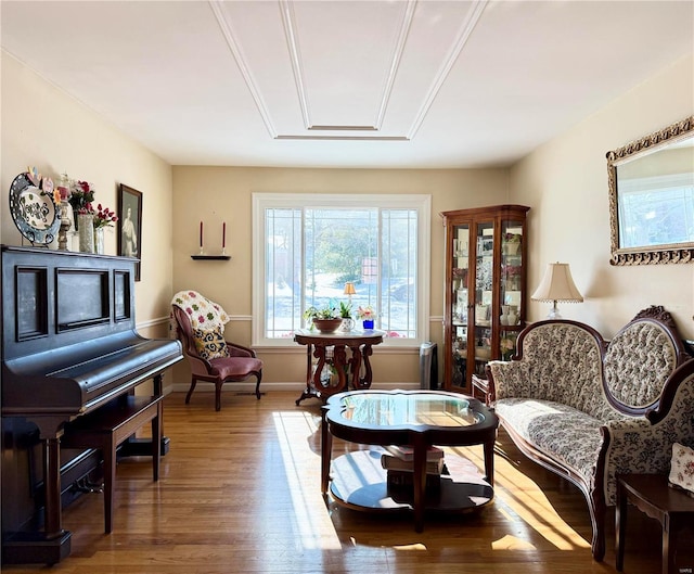 sitting room with hardwood / wood-style floors