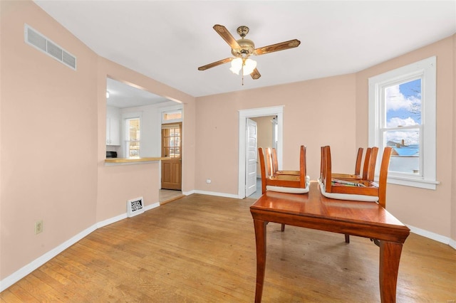 interior space with hardwood / wood-style floors and ceiling fan