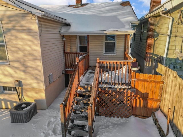 wooden terrace featuring central air condition unit