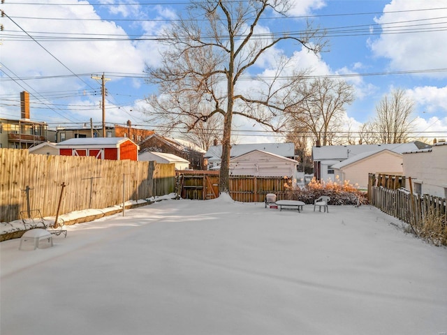 view of yard covered in snow