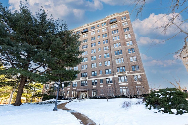 view of snow covered property