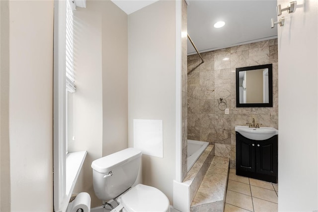 bathroom featuring tile patterned floors, walk in shower, vanity, tile walls, and toilet