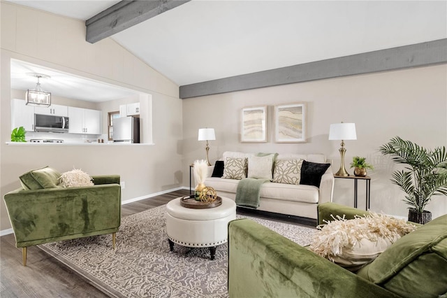 living room featuring hardwood / wood-style floors, lofted ceiling with beams, and a chandelier