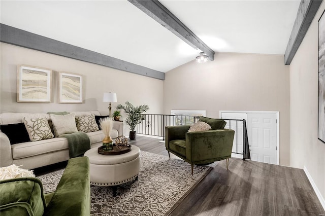 living room featuring hardwood / wood-style floors and vaulted ceiling with beams