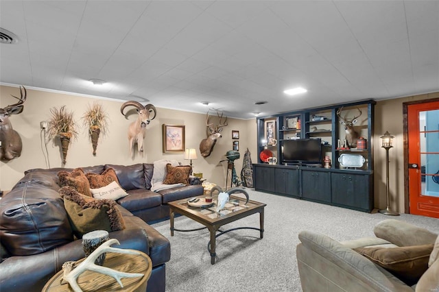 living room with carpet floors and ornamental molding