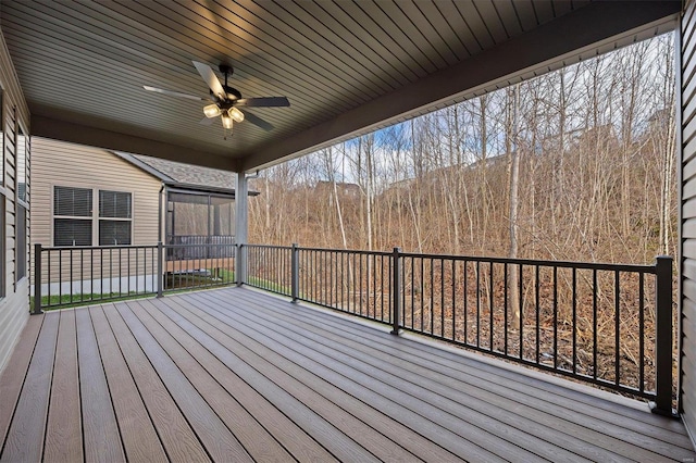 wooden terrace with ceiling fan