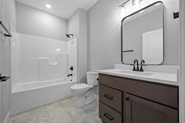 full bathroom featuring shower / bathing tub combination, vanity, and toilet