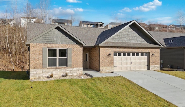 view of front of house with a garage and a front lawn