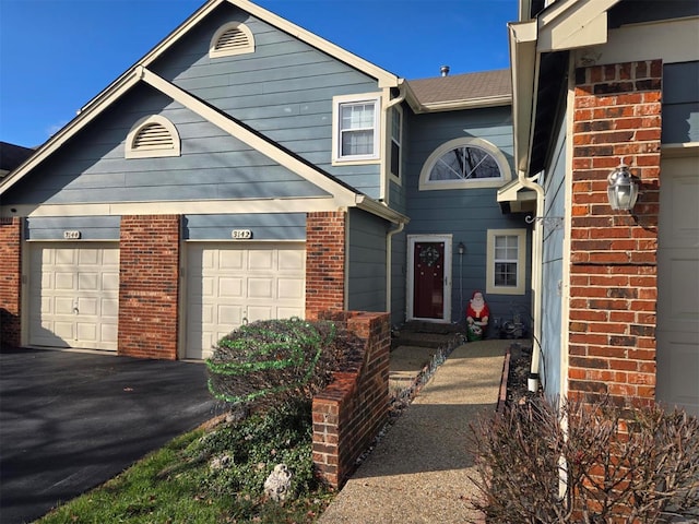 view of front of property featuring a garage