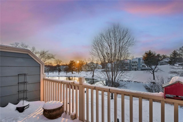 view of snow covered deck