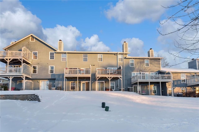 view of snow covered house