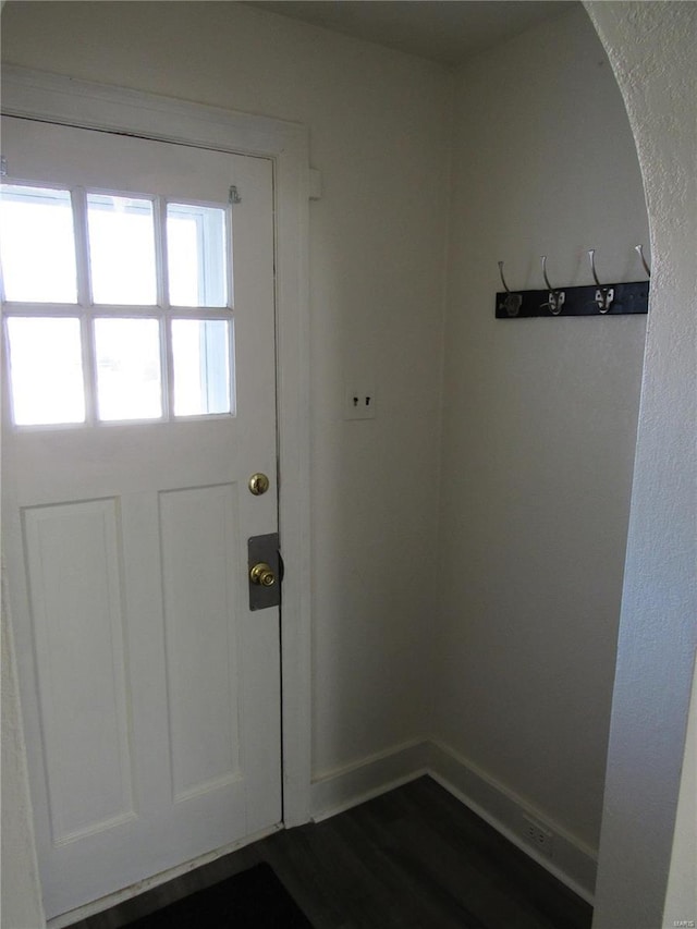 entryway featuring dark wood-type flooring