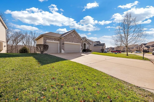 view of front of home featuring a garage and a front yard