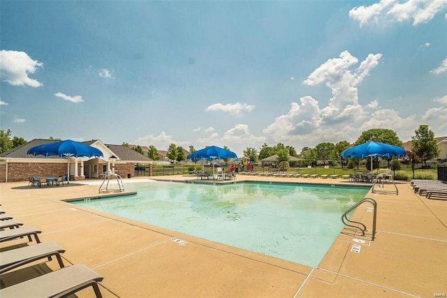 view of swimming pool featuring a patio