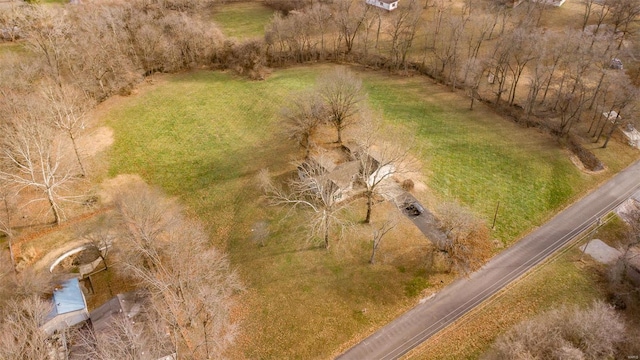 birds eye view of property featuring a rural view