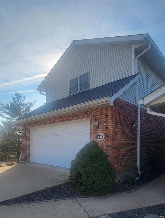 view of property exterior featuring a garage