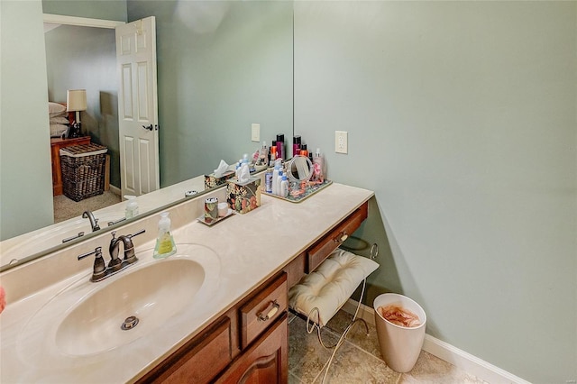 bathroom featuring tile patterned floors and vanity