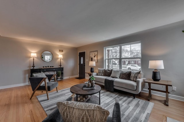 living room featuring light wood-type flooring