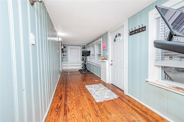 hallway featuring wood-type flooring