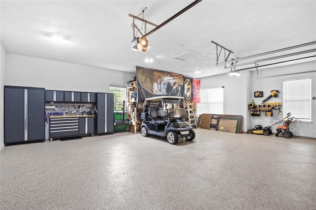 garage featuring a garage door opener