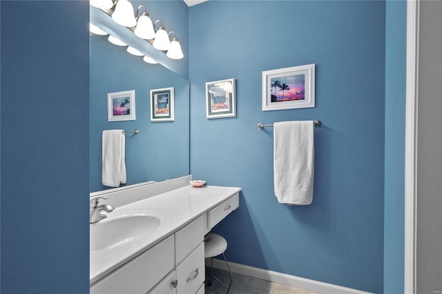 bathroom with tile patterned flooring and vanity