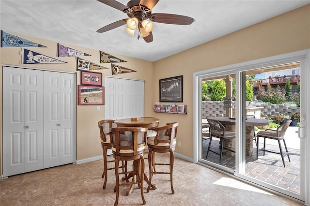 dining room with ceiling fan