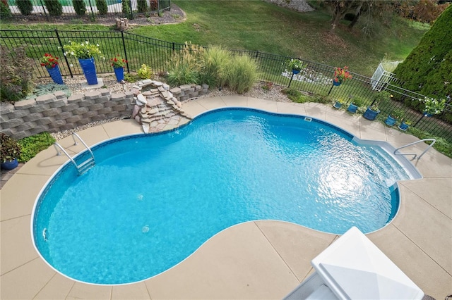 view of pool with a patio area