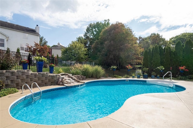 view of pool featuring a patio