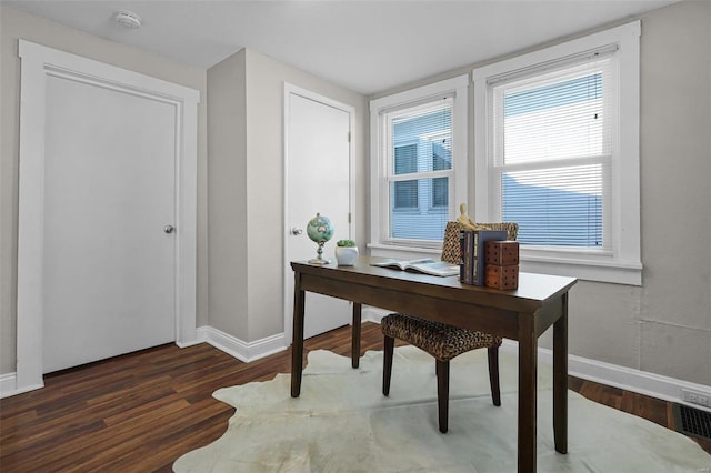 office area with dark hardwood / wood-style floors